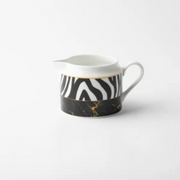 JENNA CLIFFORD - Serengeti Creamer