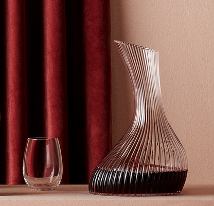 NUDE Vini Carafe 1.7L with red wine beside a tumbler