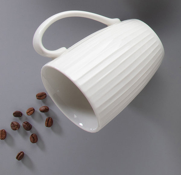 Ariane Seon Ivory Coffee Mug 300ml – styled with coffee beans