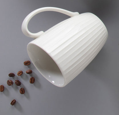 Ariane Seon Ivory Coffee Mug 300ml – styled with coffee beans