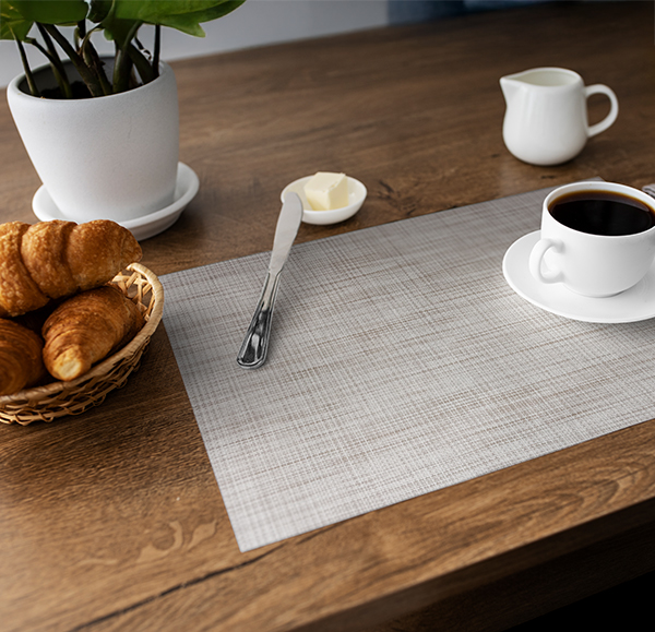 Fine Weave Sandstone Placemat styled on a dining table
